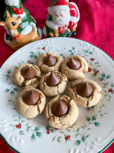 These Almond Butter Thumbprint Cookies are an almondy version of the classic peanut butter blossom cookies. They are made with some healthier ingredients, making them a great addition to your Christmas cookie lineup!