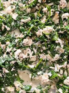 This Baked Spinach and Feta Pasta is a warm and creamy take on classic Greek Spanakopita. It's made with fresh baby spinach, a block of feta cheese, and many other delicious flavors!