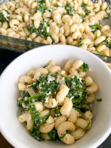 This Baked Spinach and Feta Pasta is a warm and creamy take on classic Greek Spanakopita. It's made with fresh baby spinach, a block of feta cheese, and many other delicious flavors!