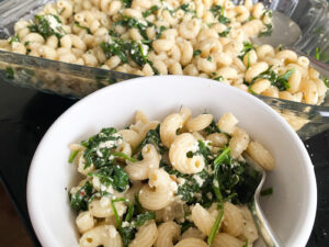 This Baked Spinach and Feta Pasta is a warm and creamy take on classic Greek Spanakopita. It's made with fresh baby spinach, a block of feta cheese, and many other delicious flavors!