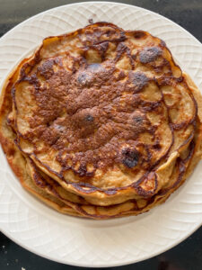 This Banana and Quinoa Pancake recipe is full of flavor and healthy ingredients including a SUPERFOOD! The pancake batter quickly comes together by blending all the ingredients together in a food processor or blender. They are naturally sweet from the bananas which balances well with the other ingredients to create a delicious and classic pancake!