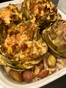 Artichokes are super healthy so they can be a great addition or star of any dinner! This recipe fills the hearty artichokes with a delicious blend of flavors and spices. They're stuffed with breadcrumbs, onions, garlic, parmesan cheese and more!