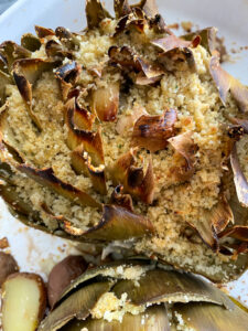 Artichokes are super healthy so they can be a great addition or star of any dinner! This recipe fills the hearty artichokes with a delicious blend of flavors and spices. They're stuffed with breadcrumbs, onions, garlic, parmesan cheese and more!